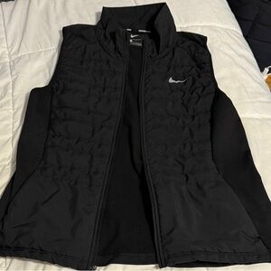 Nike Black Quilted Sleeveless Vest with Silver Swoosh